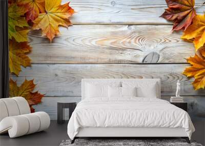 Colorful maple autumn leaves on white wooden background, top view, flat lay. Wall mural