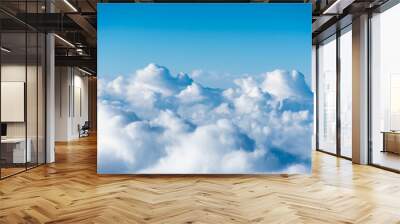 flight over the clouds. view of the clouds from the airplane window Wall mural