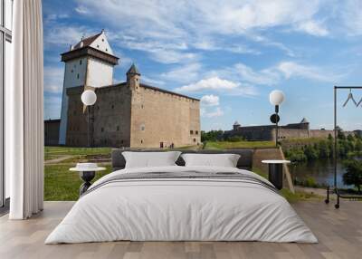 Two fortresses on parties from river which is border. Narva, Wall mural