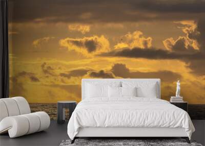 Bright yellow sunset over the dark sea Wall mural