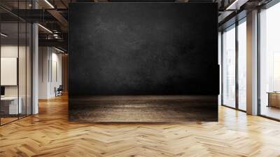 Wooden table and black wall background Wall mural