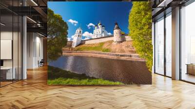 Pskov church and kremlin with blue cloudy sky Wall mural