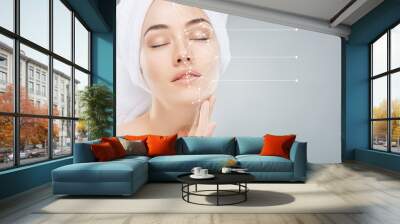 applying cosmetic cream Wall mural