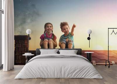 Boy and girl make a wish Wall mural