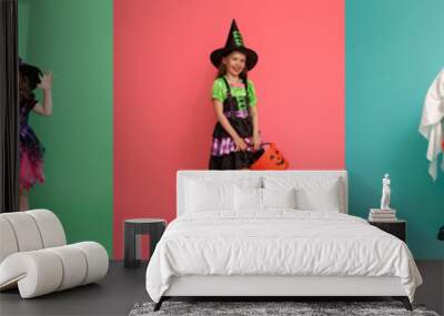 Children in carnival costumes on multicolor background. Wall mural