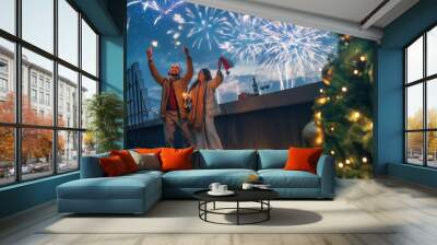 couple are celebrating Christmas Wall mural