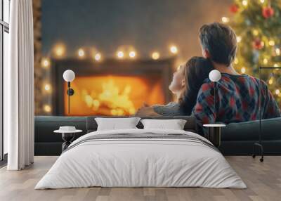 couple relaxing near Christmas tree Wall mural