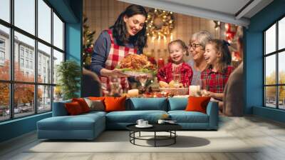 family celebrating Christmas Wall mural