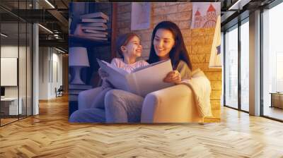 Family reading bedtime. Wall mural