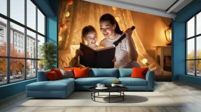 Family reading bedtime. Wall mural