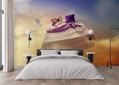 girl is flying in her bed Wall mural