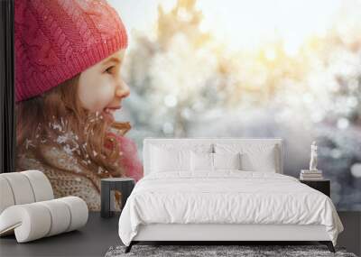 girl playing on a winter walk Wall mural