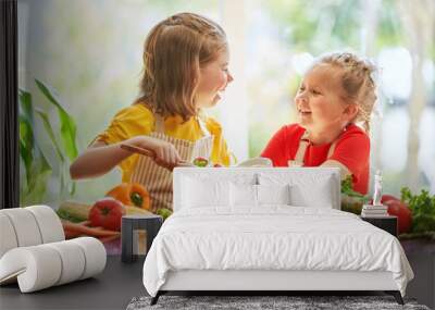 Happy family in the kitchen. Wall mural