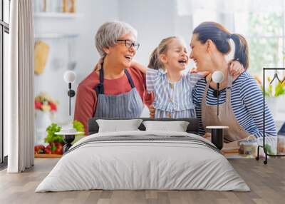 Happy family in the kitchen. Wall mural