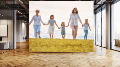 Happy family on summer walk Wall mural