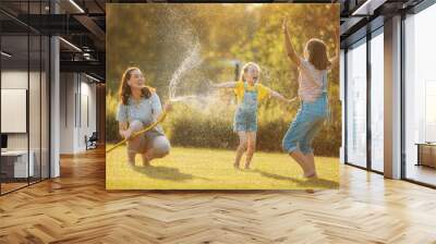 Happy family playing in backyard Wall mural