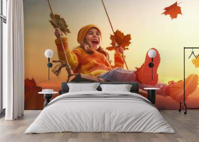 kid playing in the autumn Wall mural