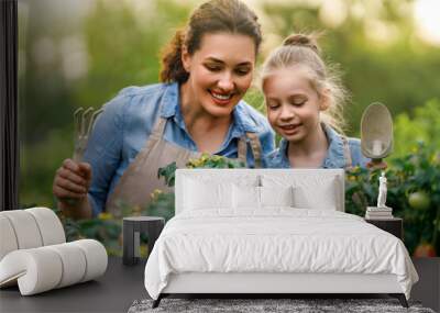 mother and daughter gardening in the backyard Wall mural