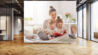 mother reading a book Wall mural