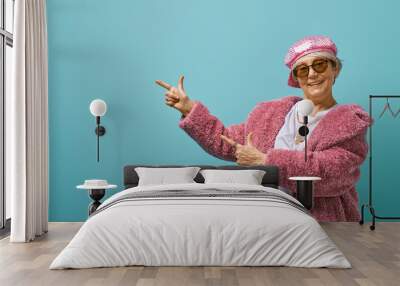 senior woman on color background. Wall mural