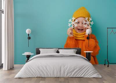 Winter portrait of happy child Wall mural