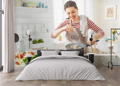 woman is preparing proper meal Wall mural