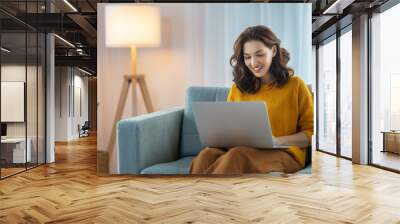 woman using laptop Wall mural