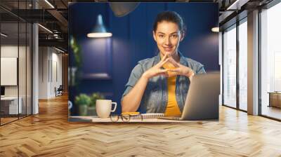 woman working on a laptop Wall mural