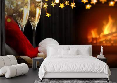 merry Christmas and happy New year; champagne and Santa hat Wall mural