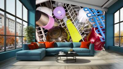 Dirty dishes in the dishwasher. Wall mural