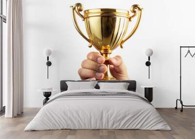 A Hand Holding a Gold Trophy on a White Background Wall mural