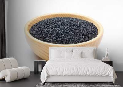 Black sesame seeds in wooden bowl Wall mural