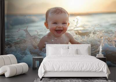 infant baby boy is playing on the sand at the beach Wall mural