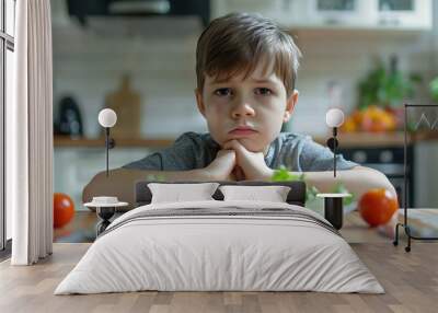 spoiled young boy does not like his salad but mom forced him to finish the whole bowl  Wall mural