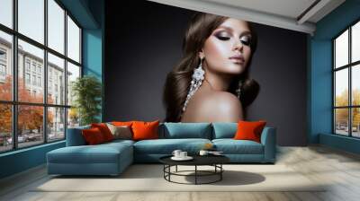 Beautiful woman with professional make up and hairstyle Wall mural