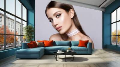 Beauty Model Woman with Long Brown Hair. Healthy Hair and Beautiful Professional Makeup. Gorgeous Glamour Lady Portrait. Haircare, Skincare concept. Wall mural