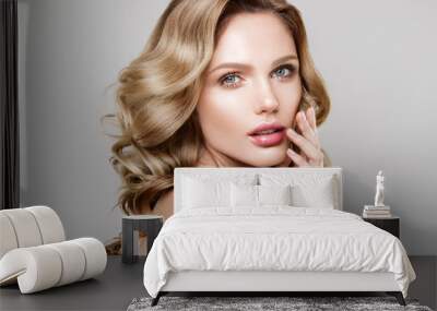 Beauty portrait of model with natural make-up. Fashion shiny highlighter on skin, sexy gloss lips make-up Wall mural