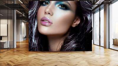 Beautyful girl with blue glitter on her face and body Wall mural