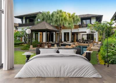 Exterior design of house, home and pool villa feature swimming pool, terrace, landscape garden and sun bed Wall mural