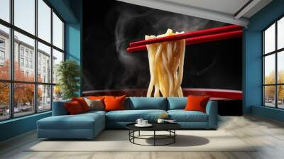 A bowl of noodles with chopsticks in it Wall mural