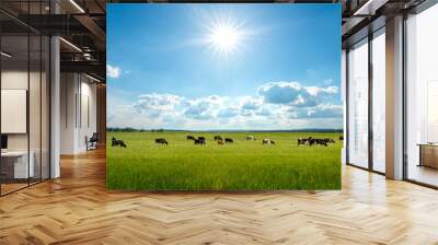 Bright summer field, blue sky and cows Wall mural