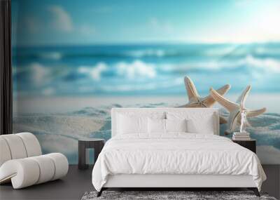 Summer vacation and travel concept. Sea star and shells on the beach. Empty space blurred background. Blue ocean and sky. Sandy beach. Wall mural