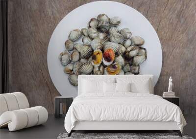 Fresh cockles on a white plate, high protein seafood, nourishing blood, beneficial to the body. (2) Wall mural