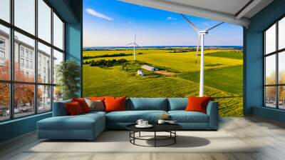 Electricity generation concept. Wind turbines on farmland, aerial landscape Wall mural