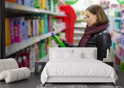 woman buying shampoo Wall mural