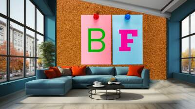 Conceptual 2 letter keyword BF (Boy Friend, Boyfriend) on multicolored stickers attached to a cork board. Sensual Love, affair and relationship between people concept Wall mural