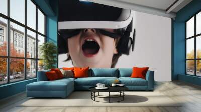 child wearing virtual reality headset, expressing excitement and joy while immersed in digital experience. scene captures thrill of modern technology Wall mural