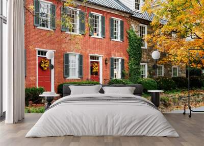 House facades in ancient American city in Virginia with traditional architecture. Ancient brick houses, stone pavements. Wall mural