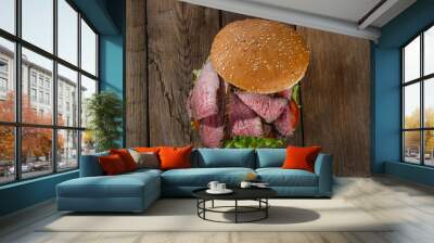 roast beef hamburger sandwich on a wooden surface Wall mural