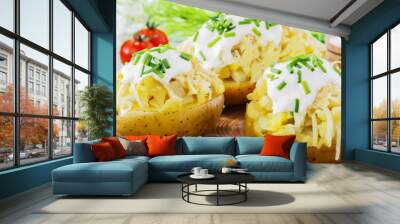 whole baked potato with cheese and sauce Wall mural